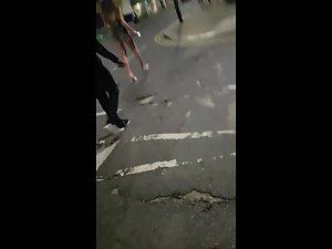 Sexy chick walks in front of her friends Picture 1