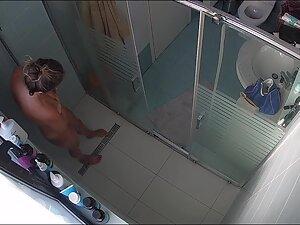 Spying on curvy woman with hard nipples in shower Picture 3