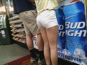 Sexy girl buying stuff in liquor store Picture 7