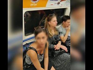 Juicy titties of hot brunette in the train Picture 3