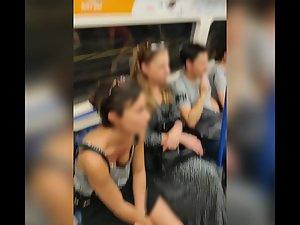 Juicy titties of hot brunette in the train Picture 4