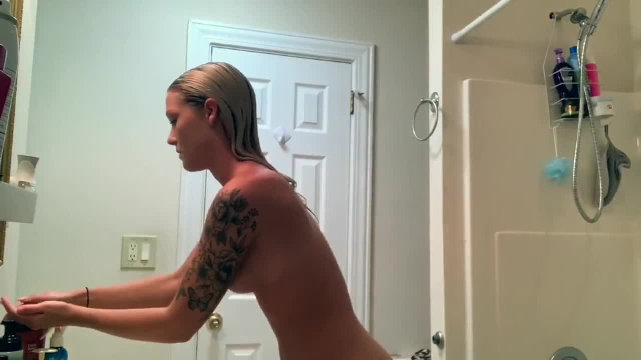 Spying on tattooed babe in and out of shower