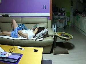 Spying her masturbate on the living room couch Picture 2