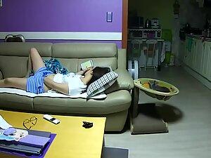 Spying her masturbate on the living room couch Picture 4