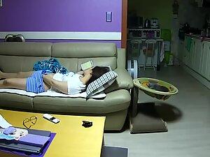 Spying her masturbate on the living room couch Picture 8