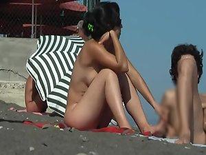 Hairy butt crack of a naked beach girl Picture 8