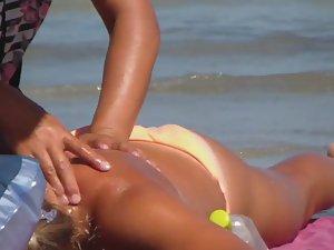Hot tanned blonde gets a massage
