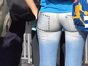Tight pants are splitting her butt in half