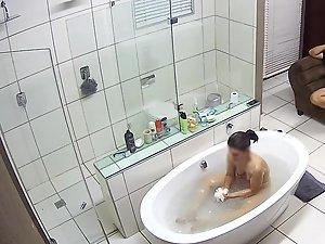 Hidden camera caught naked girl in luxury bathroom Picture 1