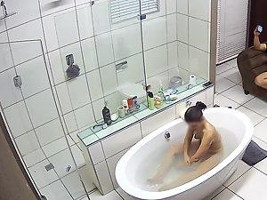 Hidden camera caught naked girl in luxury bathroom Picture 2