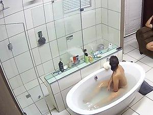 Hidden camera caught naked girl in luxury bathroom Picture 3
