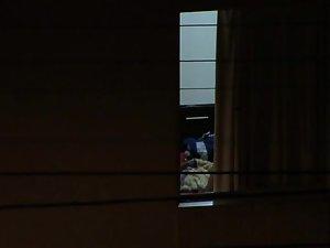 Watching my neighbor's wife undress Picture 4
