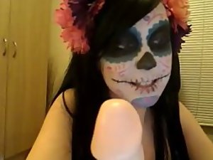 Erotic cam girl got a spooky mask on
