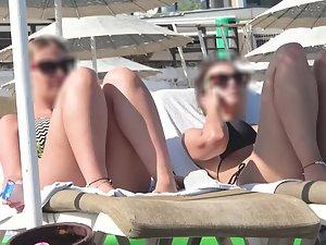 Sexy girl notices that beach voyeur is checking her out Picture 6