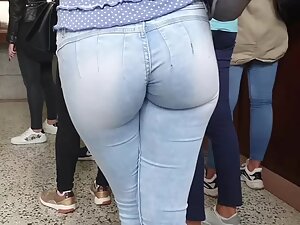 Waiting in line behind fascinating ass