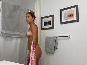 Spying on perfect naked girl with tan lines in bathroom Picture 2