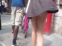 Wind revealed her cute butt and thong Picture 7