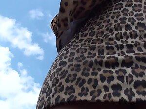 Upskirt of sexy woman in leopard skirt Picture 7