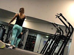 Fitness girl bends over in front of voyeur Picture 2