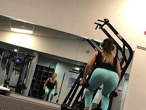 Fitness girl bends over in front of voyeur Picture 3
