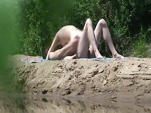 Thin girl spied as she fucks by the river Picture 7
