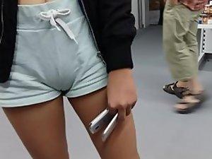 Tiny girl with big cameltoe in shorts Picture 1