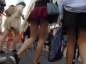 Tall girl in a very tiny miniskirt Picture 2