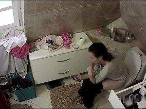 Hidden cam caught aunt watching porn and masturbating in toilet Picture 8