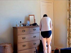 Hot milf spied while getting dressed Picture 2