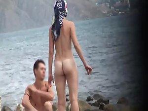 Nude girl spied as she picks up seashells Picture 3