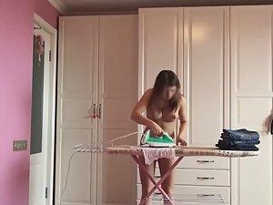 Naked wife ironing clothes at home Picture 4