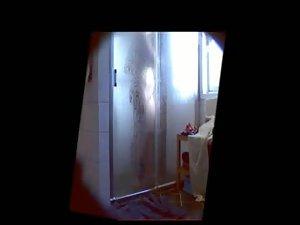 Curvy teen girl filmed under a shower Picture 5