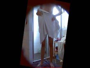 Curvy teen girl filmed under a shower Picture 7