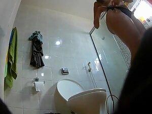 Spying on hot cousin putting a bikini on in bathroom Picture 2