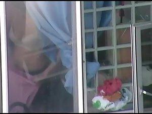 Neighbor lady peeped as she gets dressed Picture 6