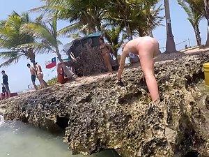 Big wet ass bends over while she climbs out of water Picture 1