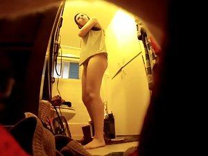 Naked sister spied with a hidden camera in bathroom Picture 1