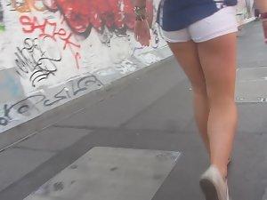 Wedgie between yummy tight buttocks in white shorts Picture 3
