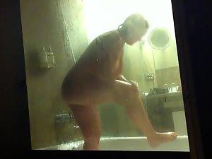Wobbly round ass peeped in shower Picture 3