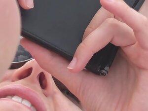 Sweet girl reads a book in doggy pose on the beach Picture 3