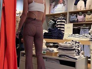 Hot store clerk spotted as soon as voyeur walks in Picture 2