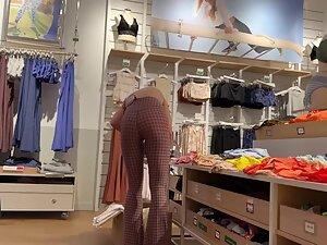 Hot store clerk spotted as soon as voyeur walks in Picture 3