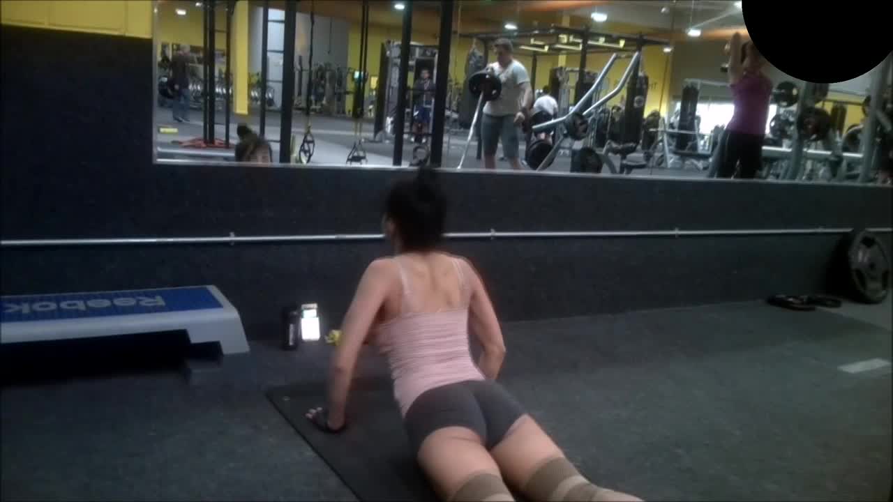Spicy asian girl does a hard workout