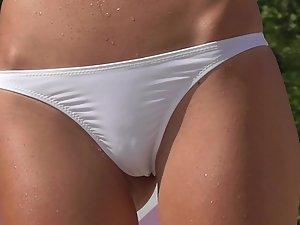 Close inspection of cameltoe and pussy in white bikini Picture 5