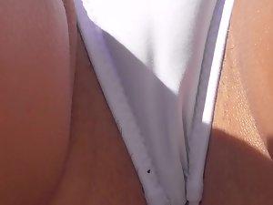 Close inspection of cameltoe and pussy in white bikini Picture 6