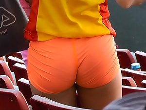Tight little ass in orange shorts