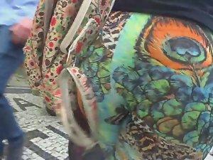 Big butt wiggles in peacock tights Picture 8