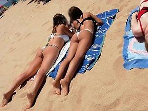 Two teen butts look like invitations for a voyeur Picture 2