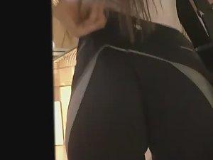 Fixing tights on an incredible ass