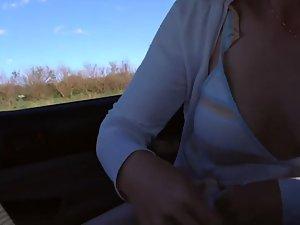 Kinky girl shows off in a moving car Picture 7